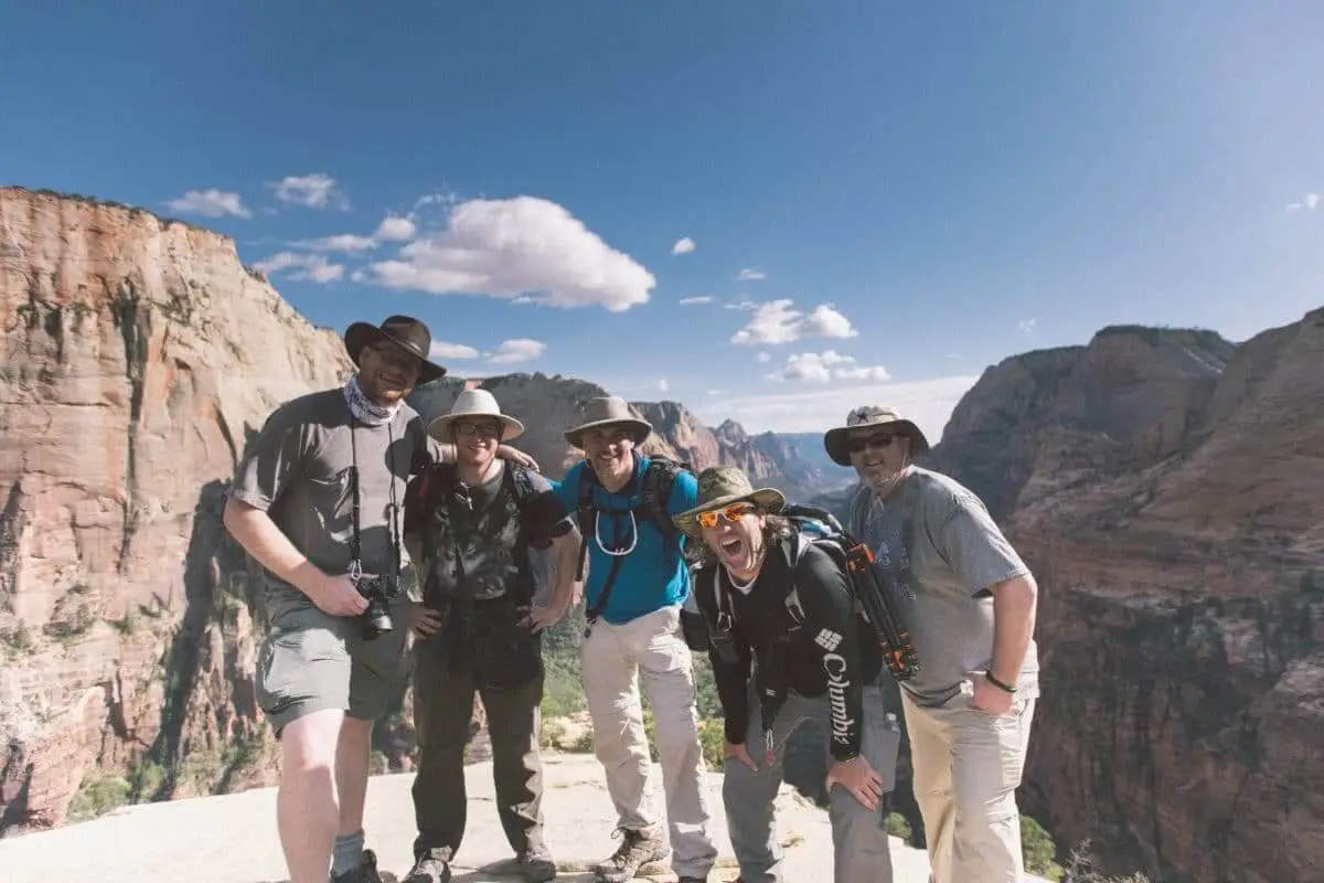 men laughing on hike