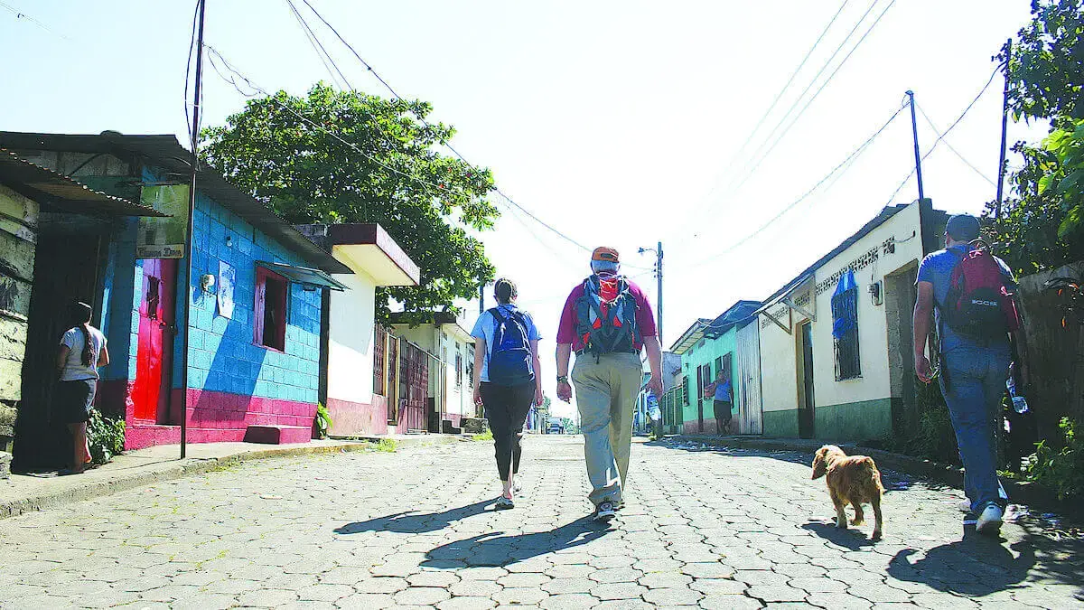 Individuals prayer walk down streets of Guatemala during missions trip