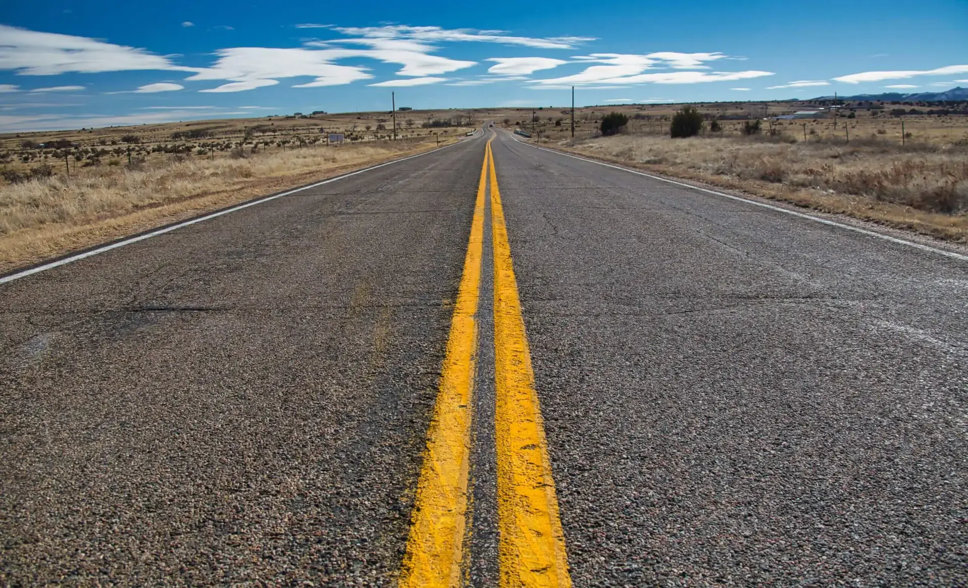 Landscape of a highway with two yellow center lanes