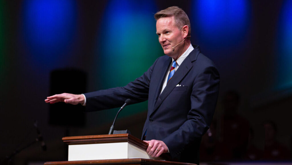 Jason Allen speaks from the pulpit at the Alabama Baptist State Convention annual meeting