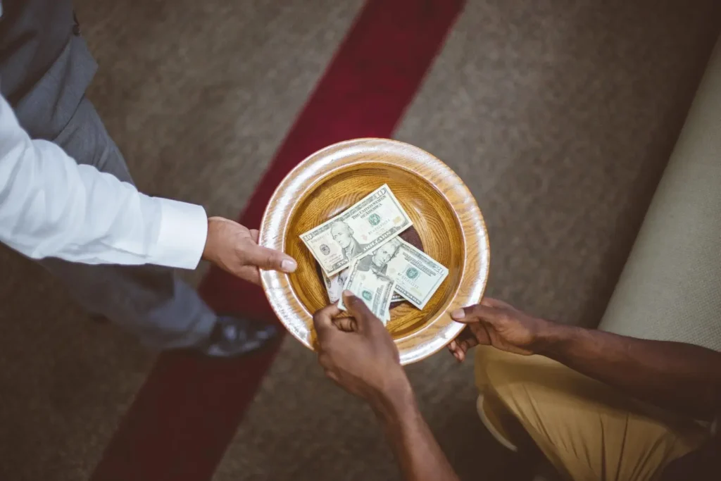 Overhead shot of a person collecting offerings