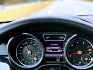 Driving gauges on car dashboard panel